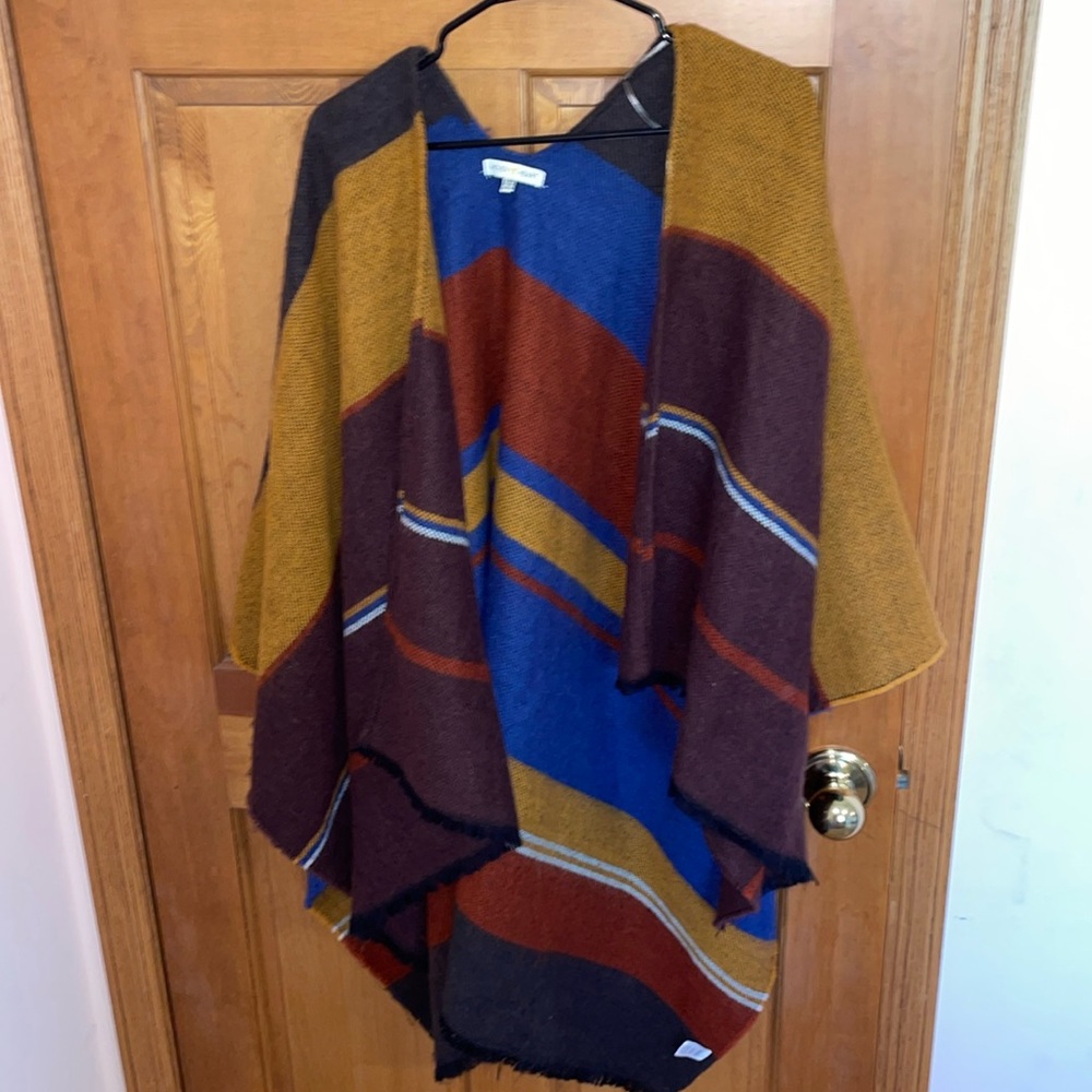 Woven heart poncho in fall colors